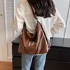 Les créateurs de sacs de mode vendent des sacs unisexes de marques populaires à 50 % de réduction Petit nouveau sac Femme Lettre Épaule simple Grande capacité