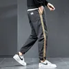 2022 New Men's Stripe Appliques Cargo Pants Men Cott Casual Jogger Calças Hip Hop Coreano Khaki ArmyGreen Sweatpants Masculino 38 U8gq #