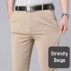 Herrbyxor man stretch solid svart smart casual byxor kontor snabb torr kostym våren höst koreansk rak