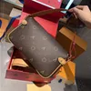 Üst lüks el çantası tasarımcısı Cowhide deri klasik ortaçağ koltuklu çanta kadın omuz çantası çapraz kanatlı çanta makyaj çantası çantası comp kklg