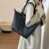 Fábrica bolsa de ombro loja frete grátis feminino grande capacidade pano de náilon novo versátil uma moda portátil editionkpf3