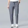 Pantaloni da uomo Primavera Autunno Elastico a vita alta Tasche con coulisse Solid Abito casual Pantaloni sportivi a gamba dritta Office Lady