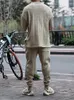 Fatos masculinos casual simples decote em v meia manga solta camisa cordão calças 2 pçs conjunto outono lazer sólido streetwear outfit para 2024
