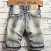 Pantaloncini di jeans elasticizzati Fi dei nuovi uomini estivi Retro High Street Style Old Slim Fit Jeans corti Splicing Design 98% Cott Marca Y9oh #