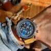 Nouvelle montre pour hommes haut de gamme à la mode avec une valeur d'apparence élevée, luxe léger, sport multifonctionnel, ceinture en acier étanche, montre à quartz rouge en maille