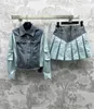 Dwuczęściowa marka designerska wiosna/lato nowy wiek Pra Reducing Sweet Style splated płaszcz w połączeniu z a-hem pół spódnicy set ykwi