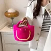 Ontwerper Luxe mode Tote Tassen Wallets Ins Ins Niche Koreaanse handtas vrouwelijk 2022 Nieuwe gebreide emmerzak net rood lachende gezicht handtas