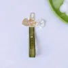 Trendig nyckelchain designer nycklar pendelle tangent spänne klassiska bokstäver tyg pärlor kedja 4 stilar högkvalitativa nyckelringar väska smycken