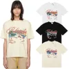 2024ss Designer Mode Rhude Cannes Plage Cocotier Imprimé Été Décontracté Hommes et Femmes T-shirt À Manches Courtes Tendance