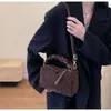 Designer de moda de luxo sacolas nova bolsa feminina design elegante dobrado portátil travesseiro saco versátil estilo ocidental único ombro crossbody bolsa feminina
