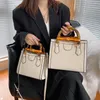 Designer väskor mode tygväskor handväska plånbok läder crossbody axel handväska kvinnor väska stor kapacitet komposit shopping väska pläd dubbel lute