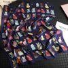 Foulards Printemps / Été Nouveau 90x90cm Marque de luxe Soie Carré Foulard Femmes Cravate Hairband Chat Imprimer Écharpe Femmes Foulard cuir chevelu magasin Q240326