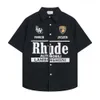 2024 Rhude Mens T Shirt di alta qualità Tess Casual Moda Rhude Polo manica corta Europa America Uomo Donna Designer T-shirt Girocollo Magliette US Taglia S-XL 2039