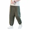 Japoński w stylu Stripe Summer Cott Linen Pants Men Streetwear Oddychane spodnie plażowe Męskie Calf-lenght spodnie W7BV#