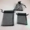 Geschenkverpackung 50 Stück schwarzer Organzabeutel Schmuck Kordelzug Kleines Tuch Multi-Size-Verpackung Weihnachten und Jahr Süßigkeiten