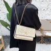 Le magasin exporte des sacs de créateurs en gros sac pour femmes à la mode de haute qualité 2024 Nouvelle chaîne crossbody bodal multi-compartiment petit sac à dos de style carré