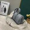 M22762 Lavado Demin Moda Mens Sacos de Viagem 25x15x11 CM Womens Luxurys Designers Duffels Bag Mini Denim Flower Soft-Edged Mala Duffel Bolsa com Alça de Ombro