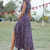 Casual jurken zomer bohemien stijl bedrukte bloemenjurk voor dames strandvakantie hoge taille sexy v-hals onregelmatige zoomlijn vrouwelijk lang