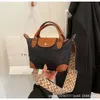Factory Source High Quality Handbags Is French Contrasting Color Bag for Women 2024 New Trendy and Fashionable British Style Dumpling Casual Nylon Fabric Commuting