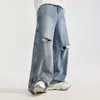 Herrbyxor högkvalitativa män rippade jeans vintage blå bred ben denim sidoknapp lapptäcke hip hop spring streetwear baggy byxor