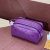 24SS Kvinnliga män kosmetiska väskor fodral ska påsar läder diagonal crossbody väska för damer lyxdesigner handväska korthållare utomhus rese plånbok 28 cm