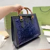 Luxe vrouwen tote handtas ontwerper klassieke bamboe handvat flash decoratie tassen vrouwen grote capaciteit winkelen handtassen modieuze glanzende portemonnee