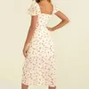 Slim-fit jurk met split, pofmouwen en bloemen 168721