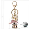 Keychains Lanyards Cute Keychain Pearl Crystal String Carousel For Women Key Chain Jewelry Gift Accessories