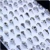 Anneaux de bande En gros 100pcs / lot anneau sier creux coeur amour couronne fleur mélange style mode doigt pour les femmes cadeau de mariage bijoux goutte otlss