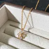 1: 1 Colliers de créateurs haut de gamme pour femmes Version haute Collier avec croix Tiffins pour femmes Pendentifs en diamant en forme de X en or rose 18 carats avec logo original Tiffin