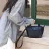 Shop Sac à bandoulière Pas cher Exportation Dumpling Bun Swift Cuir de vachette Haut de gamme Poignée courte Sac à main avec cuir véritable Polyvalent Une épaule Femme