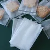 Cadeau cadeau 100pcs sacs de bonbons translucides biscuits paquet pochettes auto-adhésives fête de Noël cuisson