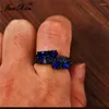 Avec des pierres latérales boho femelle bleu ovale ring