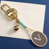 Very Cute tennis racket metal keychains Unisex charm Key Pendant Letter designer key chain Luxury Car key ring for Fashion men women with Original box