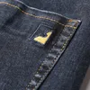 Mäns jeans 2024 Hösten/vinter tjock för höst och vinter all-match fashionabla casual bomulls bekväm stretch emb