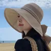 Chapeaux à large bord Chapeau de pêcheur Bowknot Arrivée Printemps / Été Grand écran solaire anti-UV ombrage du visage avec petit effet