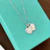 Początkowy designerski naszyjnik dla kobiet puste wisiorek w kształcie serca Symuluje Pearl Cz Diamentowe naszyjniki