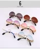 Nya ovala solglasögon för kvinnor Rimless Diamond Cutting Lens Sun Glasses Female Ocean Clear Purple Lenses Lentes de Sol9519553