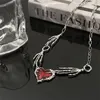 Catene Collana con cuore artiglio con teschio gotico per donna Alla moda Spina di cristallo rosso Amore Girocolli scuri esagerati Accessori Gioielli di moda