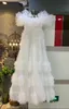 Robes décontractées Col de bateau blanc Mesh plissé élégant mode robe de mariée de mariée luxueuse jupe bouffante vêtements de performance pour femmes