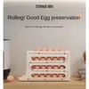 Butelki do przechowywania przesuwane pojemnik na jajka wygodne automatyczne ratunkową uchwyt na lodówkę lodówkę kuchenną oszczędność przestrzeni z rozbiegiem wstrząśniętym