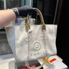 Bolsos de mano de moda Bolso de diseñador Perla de lujo Bolso grande junto al mar Diseñador de alta calidad Señoras Capacidad de hombro Compras Bolsas de playa Bolso de lona Cartera