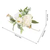 Corpetti da polso con fiori decorativi per la festa di ballo di nozze, fiori di sposa, rose bianche e foglie verdi
