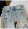 Dżinsy haftowane kwiatowe kobiety 2024 wiosna i jesienne retro luźne luźne, swobodne wysokie preparaty ol słodkie mody szerokie nogi spodnie