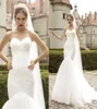 Våren 2022 Backless Mermaid Beach Wedding Dress Long Train Högkvalitet Axless Bridal Dresses2431303