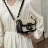 16% rabatt designer väska 2024 handväskor gris näsa singel axel crossbody womens populära i år enkel kontrastfärg liten och avancerad tryckt för kvinnor