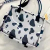 Borse a tracolla Donna 2024 Borsa tote in nylon Kawaii per ragazza Moda Shopper in PVC impermeabile Borsa a tracolla con stampa di mucca simpatico cartone animato