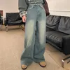 Damskie spodnie retro z szerokim nogi dżinsy dla kobiet we wczesnej wiosny w stylu z szorstkimi krawędzią i luźnym pasmowym zużyciem
