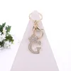 Wholesale Fashion 26 Letter Metal Keyring Rhinestone Initial Keychain Bag Pendant Charms DIY Accessories Birthday Jewelry Gifts