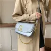 Kvinnors handväska högt estetiskt värde, koreansk stil lätt high-end-kedja mångsidig mode underarmspåse singel axel crossbody nisch pendling väska